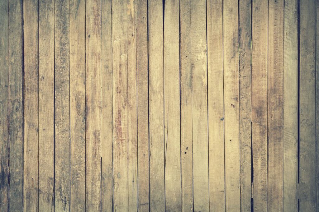 🧱 Premium Wallpapers Rustic wooden planks forming a textured background, ideal for design projects.
